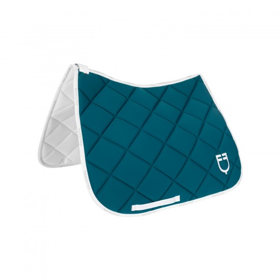 SOTTOSELLA PER CAVALLO  DRESSAGE IN TESSUTO TECNICO CON LOGO equestro Sottosella da dressage modello GP realizzato in tessuto tecnico ideato per ridurre al minimo gli spostamenti della sella, gli urti evitando ogni tipo di fiaccatura.
